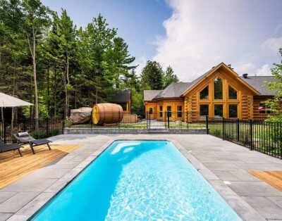 Splendide chalet de bois rond avec piscine chauffée – Domaine du Lac Fiddler